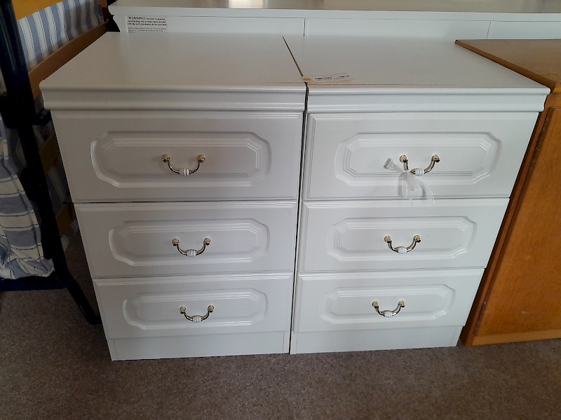 Pair of white bedside cabinets